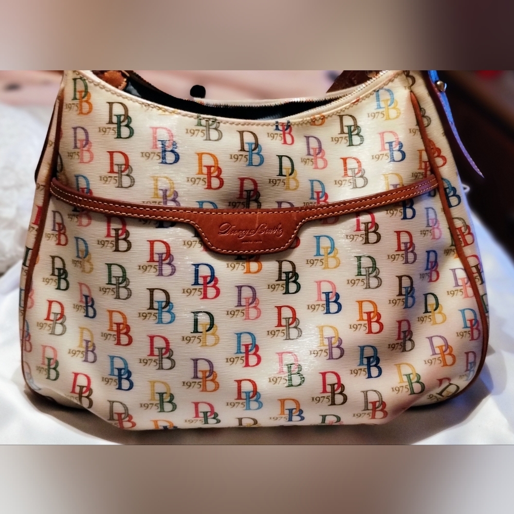 Multi color DB 75 Dooney and Bourke bag.